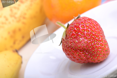 Image of strawberry, mandarin, orange, banana, many different fruits for the health of the entire family