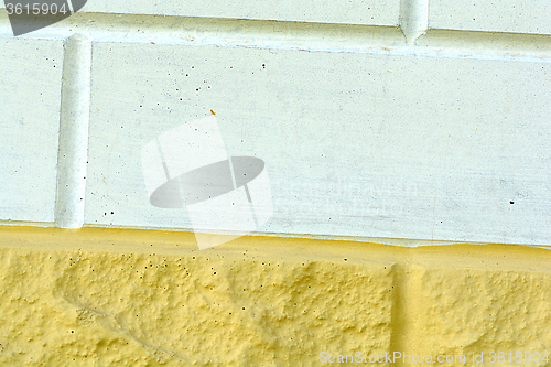 Image of white and yellow brick wall texture