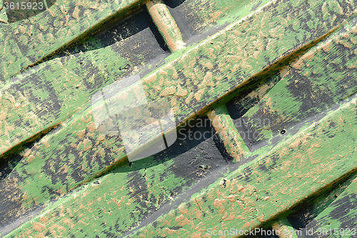 Image of Old rusty green corrugated metal wall