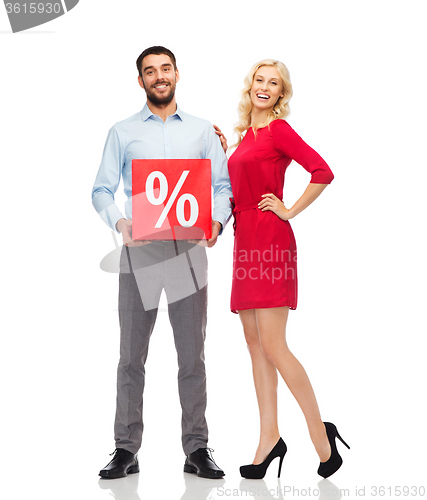 Image of happy couple with red sale sign