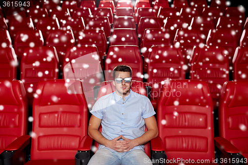 Image of young man watching movie in 3d theater
