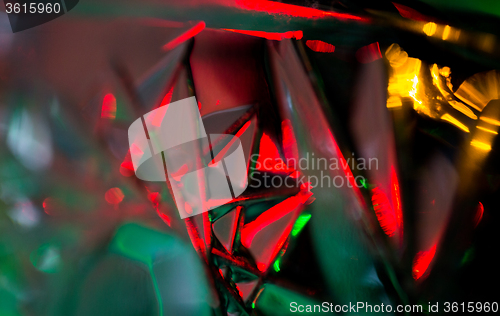 Image of illuminated glass pattern bokeh over dark