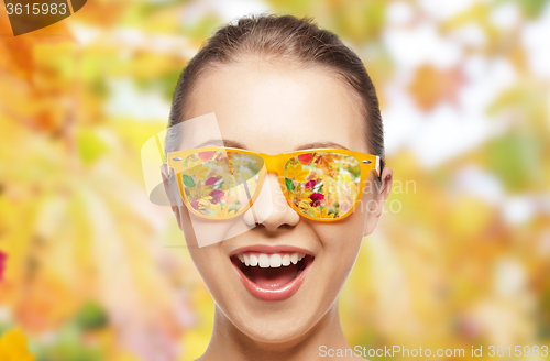 Image of happy face of teenage girl in sunglasses