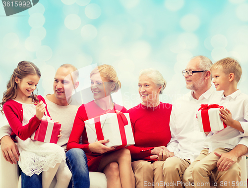 Image of smiling family with gifts