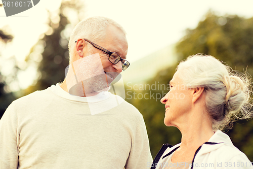 Image of senior couple in city park