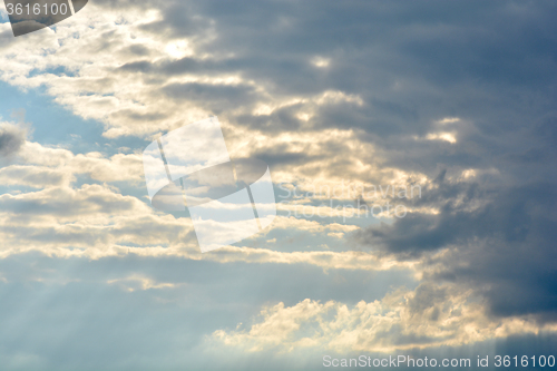 Image of Overcast day sun beam through the clouds