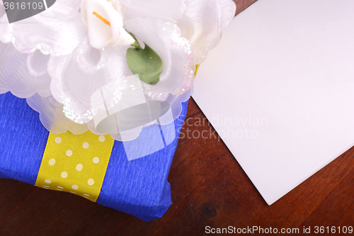 Image of color gift boxes on wooden background