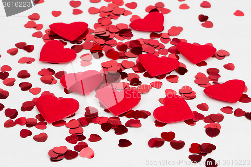 Image of Red hearts confetti and fabric heart