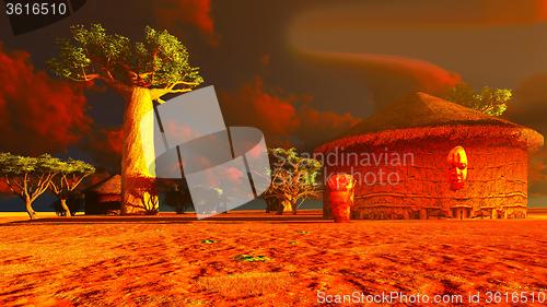 Image of African village with traditional huts 