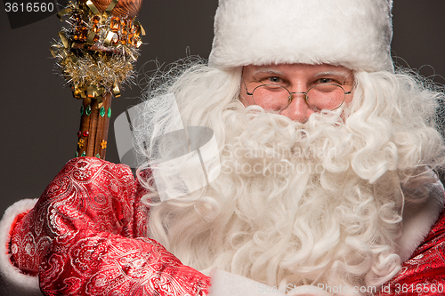 Image of happy Santa Claus looking at camera