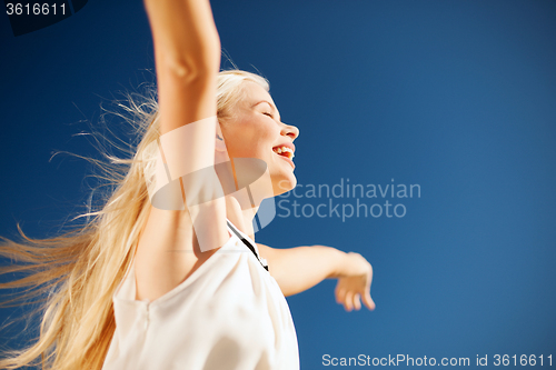 Image of beautiful woman enjoying summer outdoors