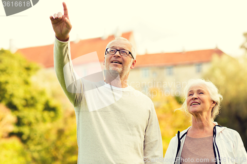 Image of senior couple in city park