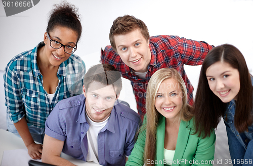 Image of group of happy high school students or classmates