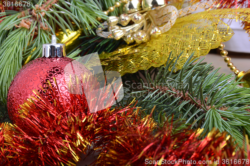 Image of Christmas composition with gift box and decorations