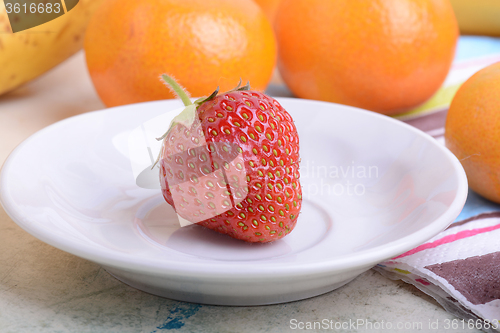 Image of strawberry, mandarin, orange, banana, many different fruits for the health of the entire family