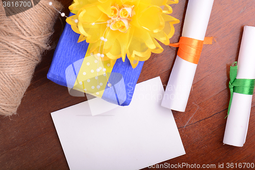 Image of color gift boxes on wooden background