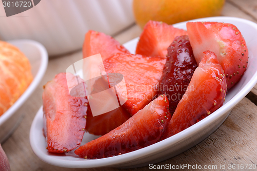 Image of Fresh colorful fruits composition mandarin, strawberry, peach, bananas and orange