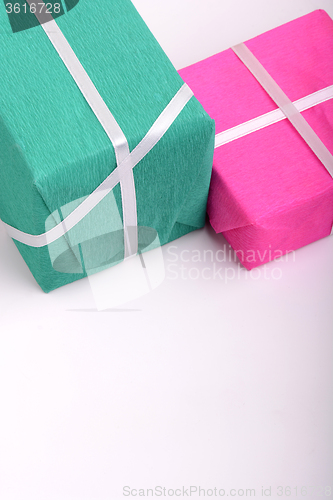 Image of gift box set with white ribbon on white background