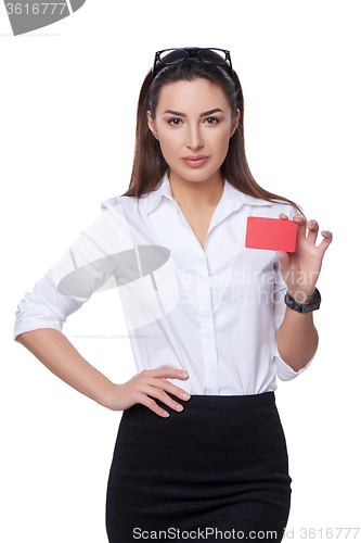 Image of Business woman holding credit card