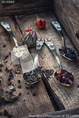 Image of Accessories for tea in a vintage wooden box