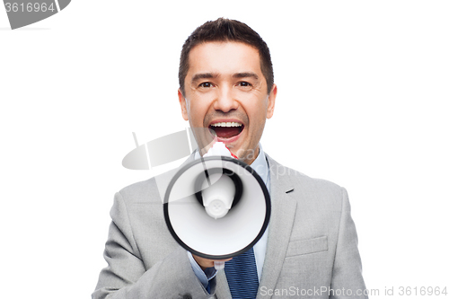 Image of happy businessman in suit speaking to megaphone