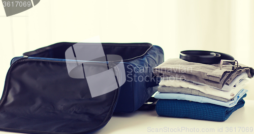 Image of close up of business travel bag and clothes