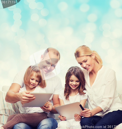 Image of happy family with tablet pc computers