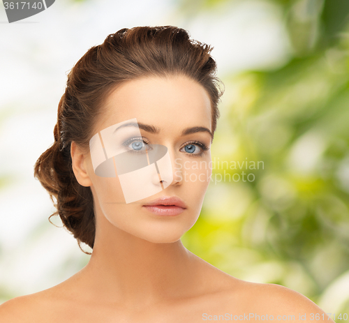 Image of beautiful woman with updo