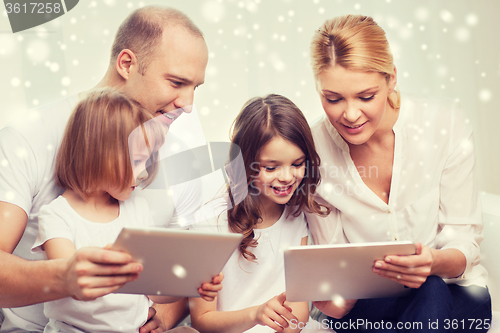 Image of happy family with tablet pc computers