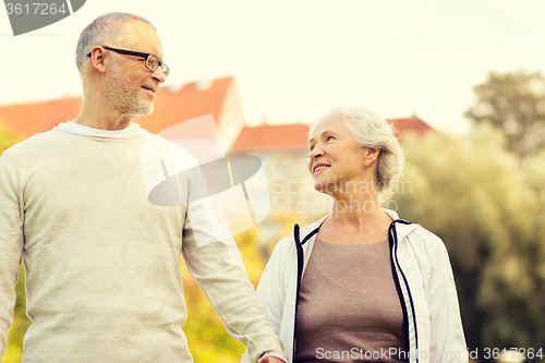 Image of senior couple in city park