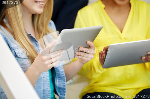 Image of close up of students with tablet pc at school