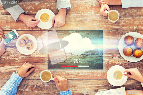 Image of close up of business team drinking coffee on lunch