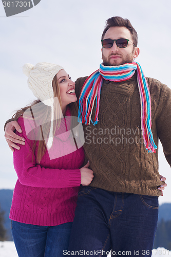 Image of romantic young couple on winter vacation
