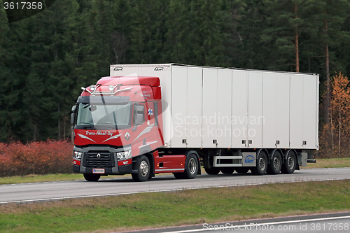 Image of Red Renault Trucks T Semi on Motorway