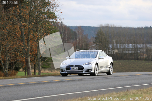 Image of Silver Tesla Model S Electric Car On the Road