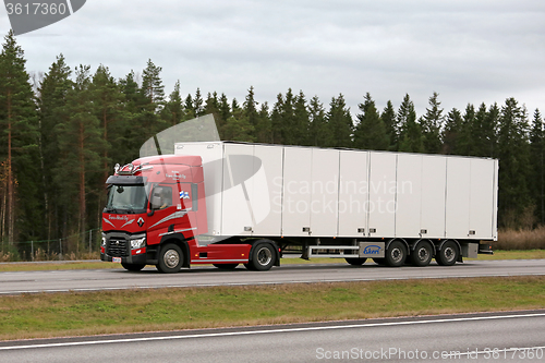 Image of Red Renault Trucks T Semi on Motorway