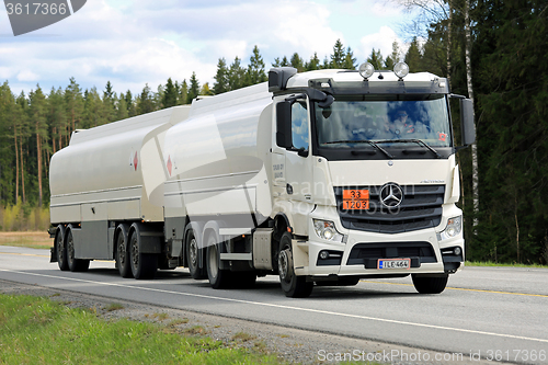 Image of White Mercedes-Benz Actros 2545 Tank Truck on the Road