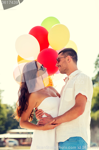 Image of smiling couple in city