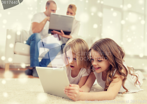 Image of happy family with tablet pc computers