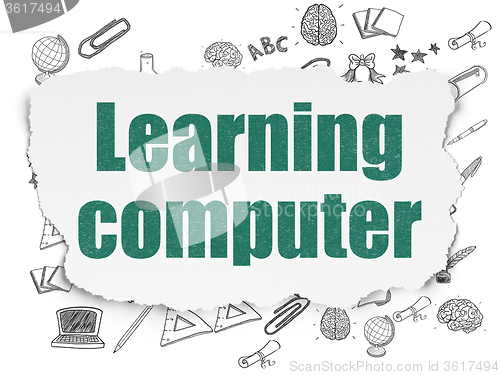 Image of Education concept: Learning Computer on Torn Paper background