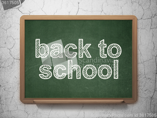 Image of Learning concept: Back to School on chalkboard background