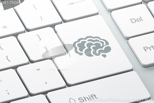 Image of Science concept: Brain on computer keyboard background