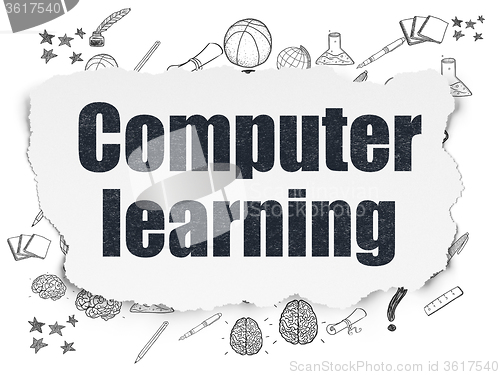 Image of Education concept: Computer Learning on Torn Paper background