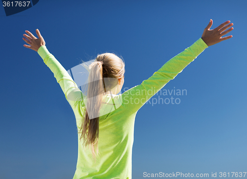 Image of woman doing sports outdoors