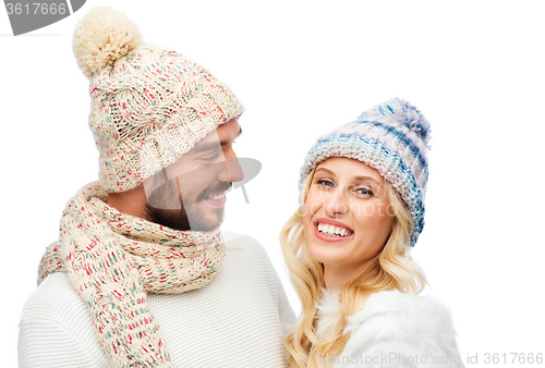 Image of smiling couple in winter clothes