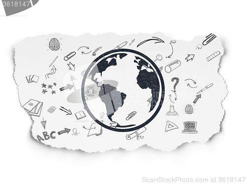 Image of Education concept: Globe on Torn Paper background