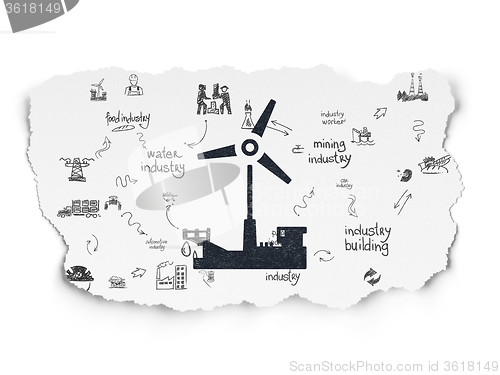 Image of Industry concept: Windmill on Torn Paper background