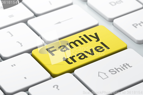Image of Travel concept: Family Travel on computer keyboard background