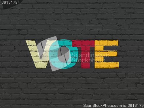 Image of Politics concept: Vote on wall background