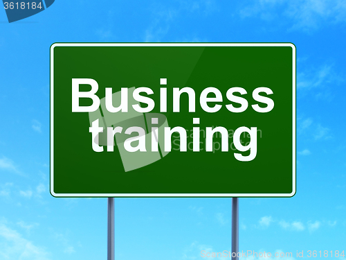 Image of Education concept: Business Training on road sign background